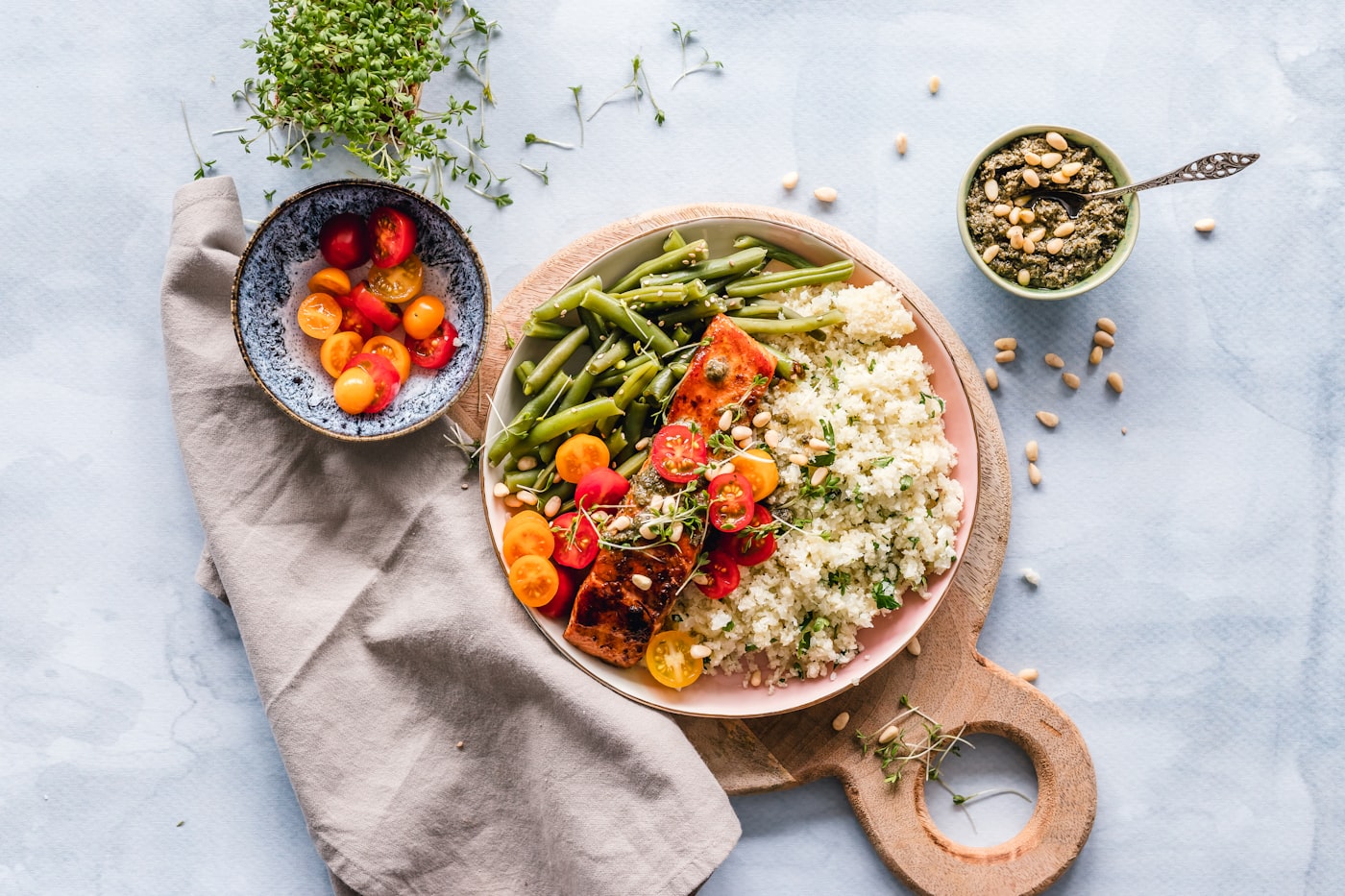 Plate of salmon, couscous, and green vegetables